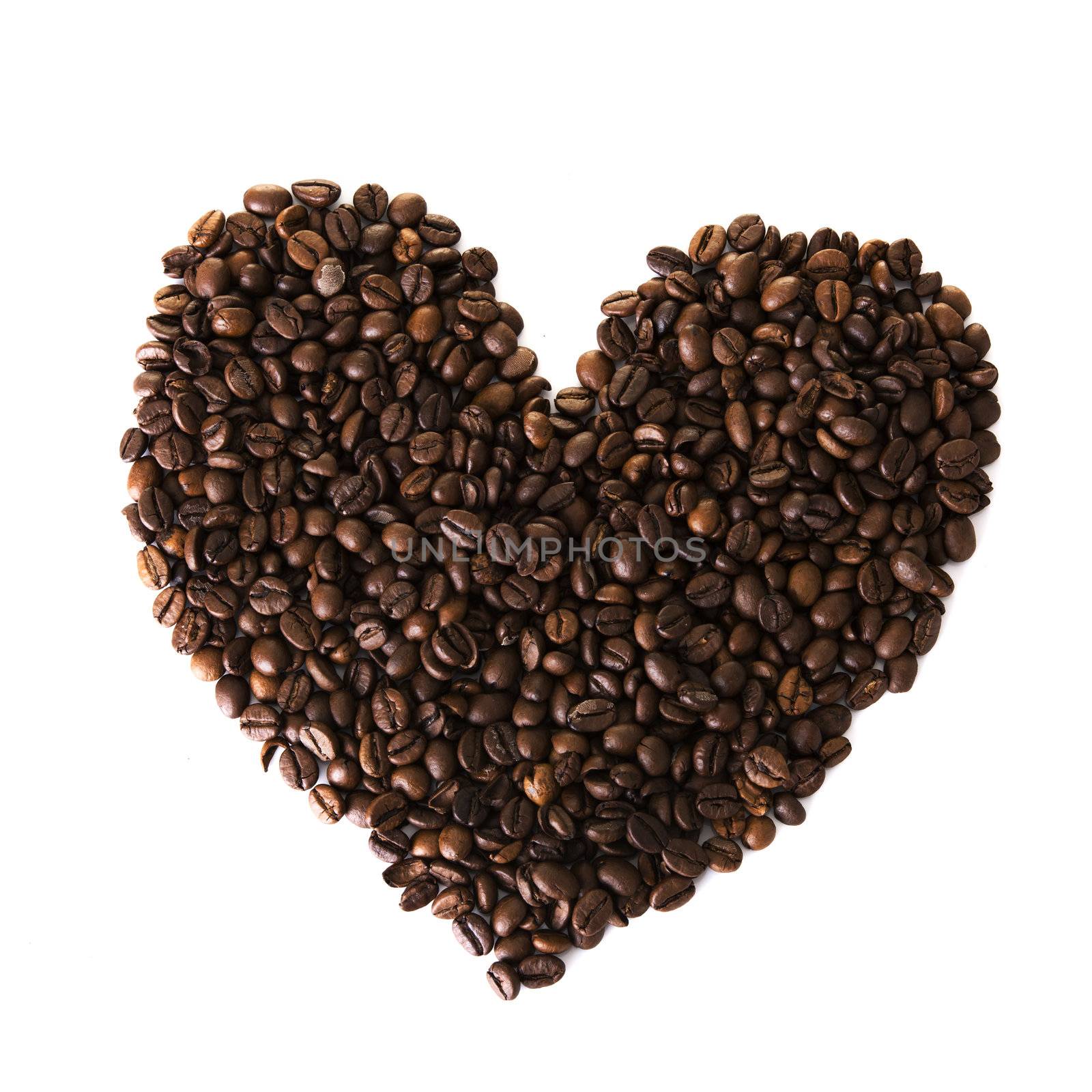 Heart from coffee beans isolated on a white background