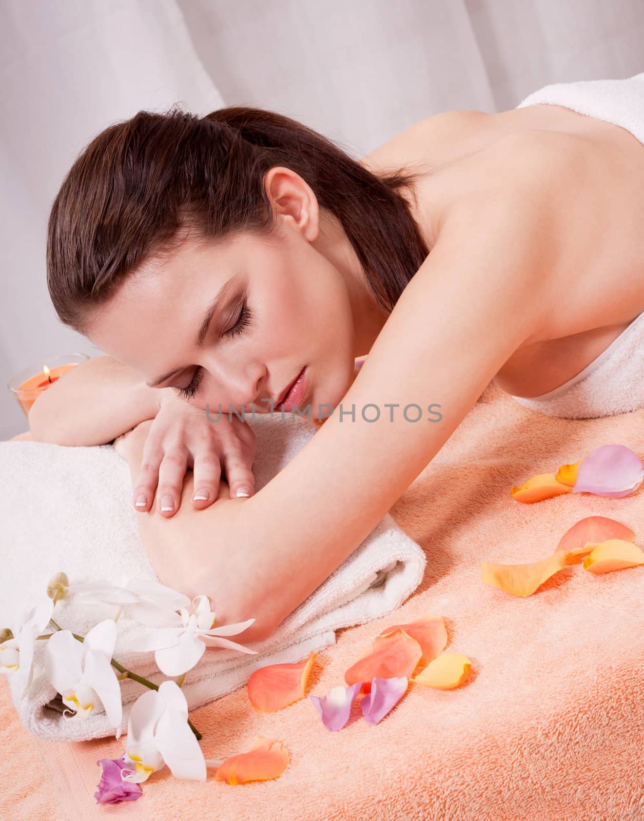 young attractive smilig woman doing wellness spa relaxing massage