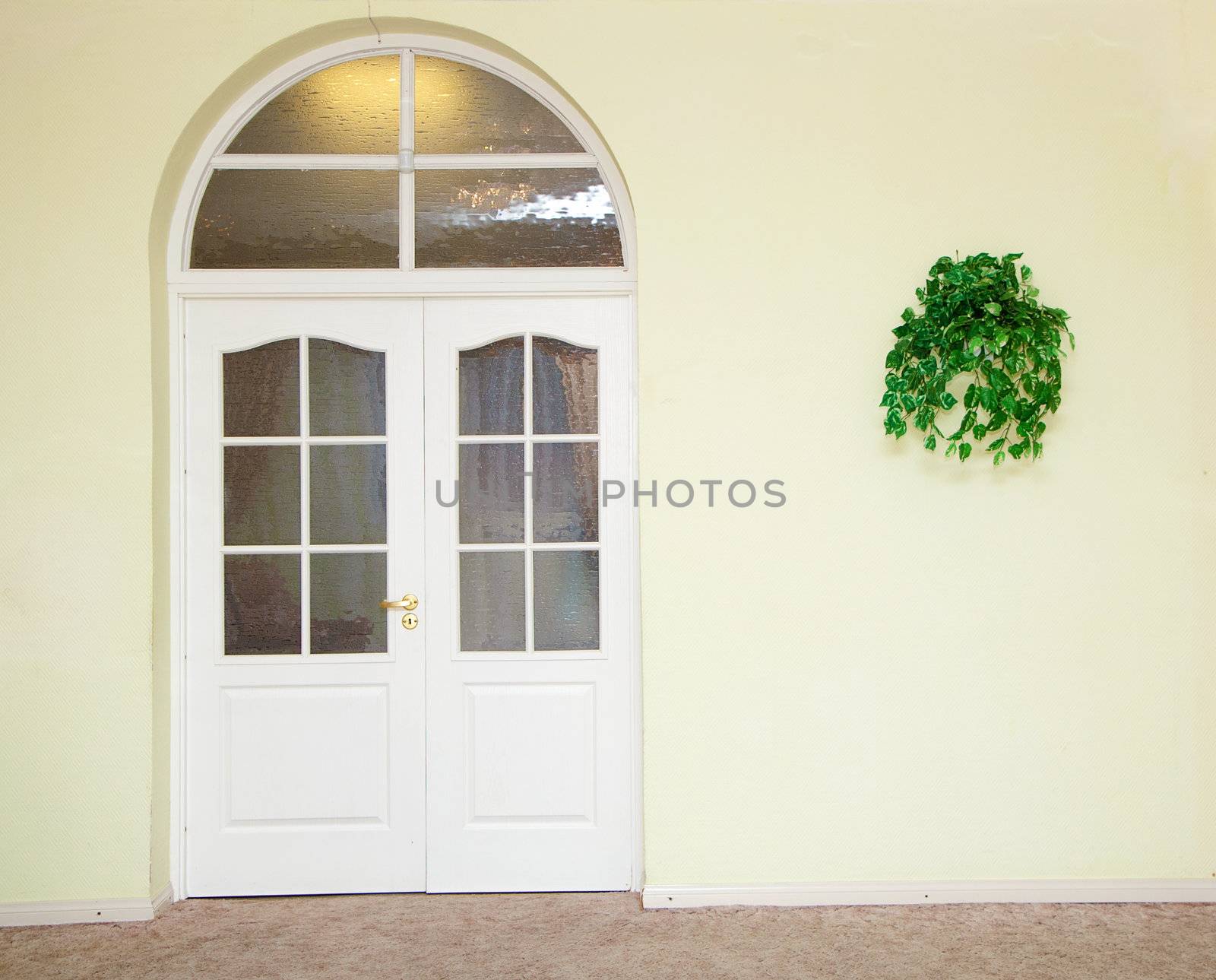 door-arch in the yellow wall. Interior Indoor