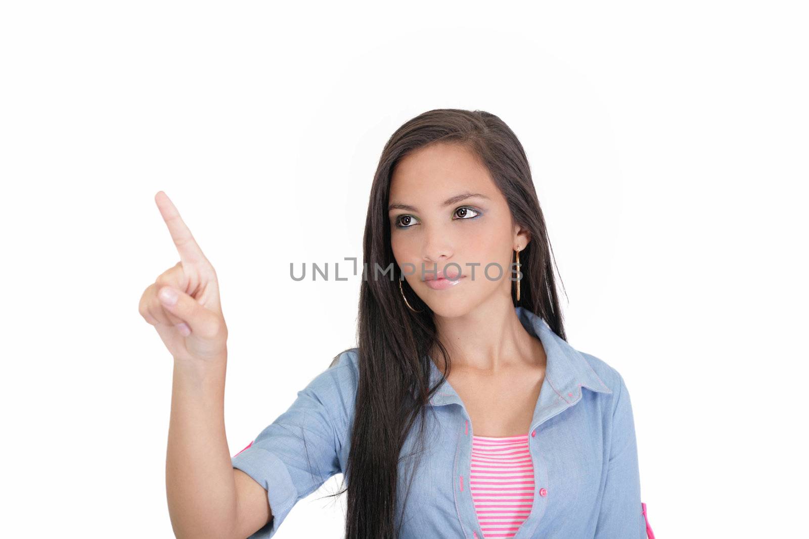 Portrait of young business woman pointing at white background by dacasdo