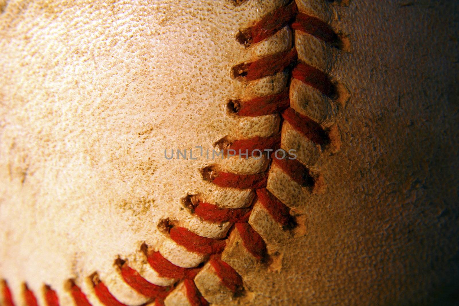 Closeup of an old, weathered baseball by mahnken