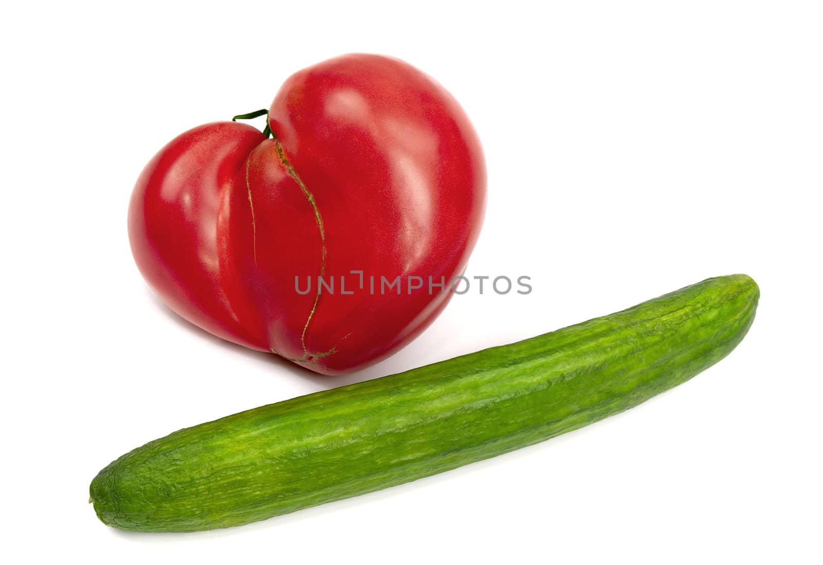A giant heart-shaped tomato and longest cucumber by Kamensky
