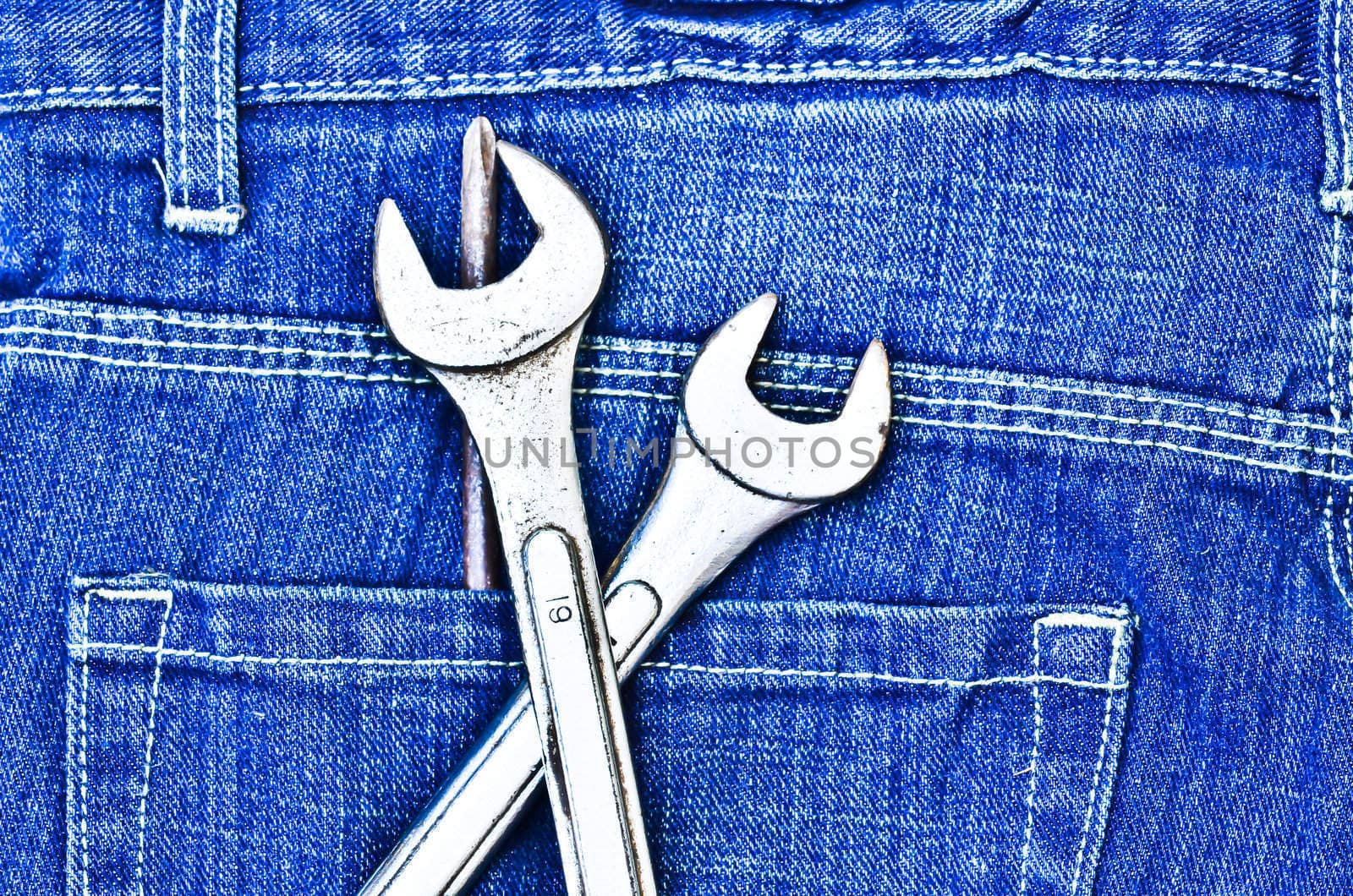 tools  and blue jeans
