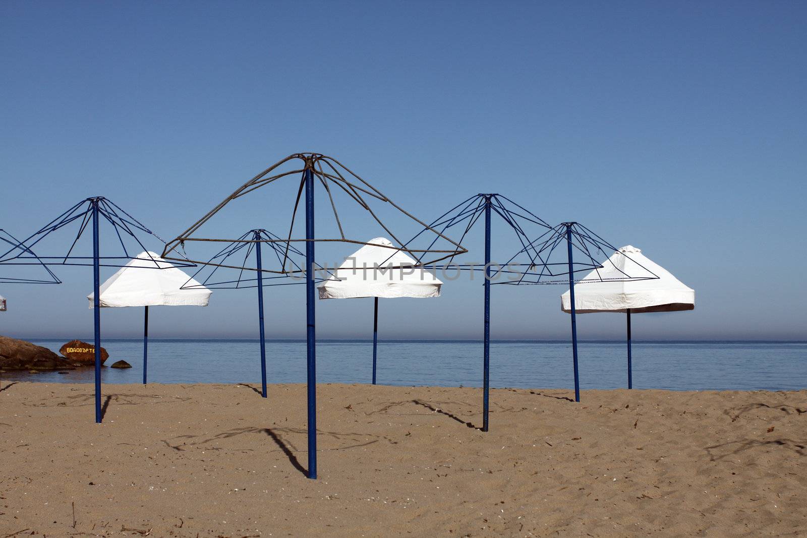 beach umbrellas by alexkosev
