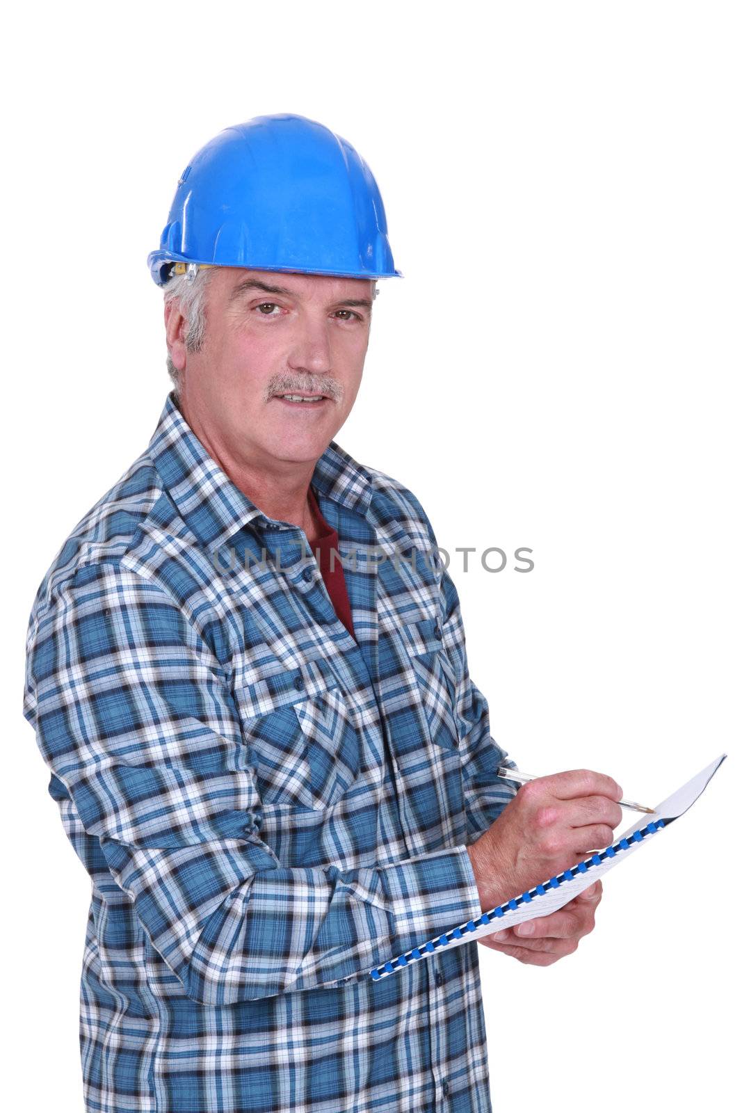 Construction foreman evaluating an employee by phovoir