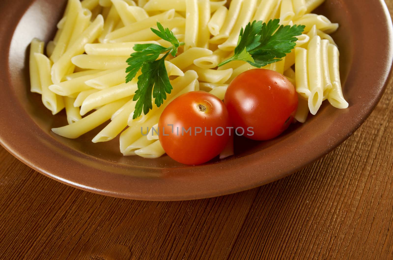 delicious macaroni pasta on wooden table