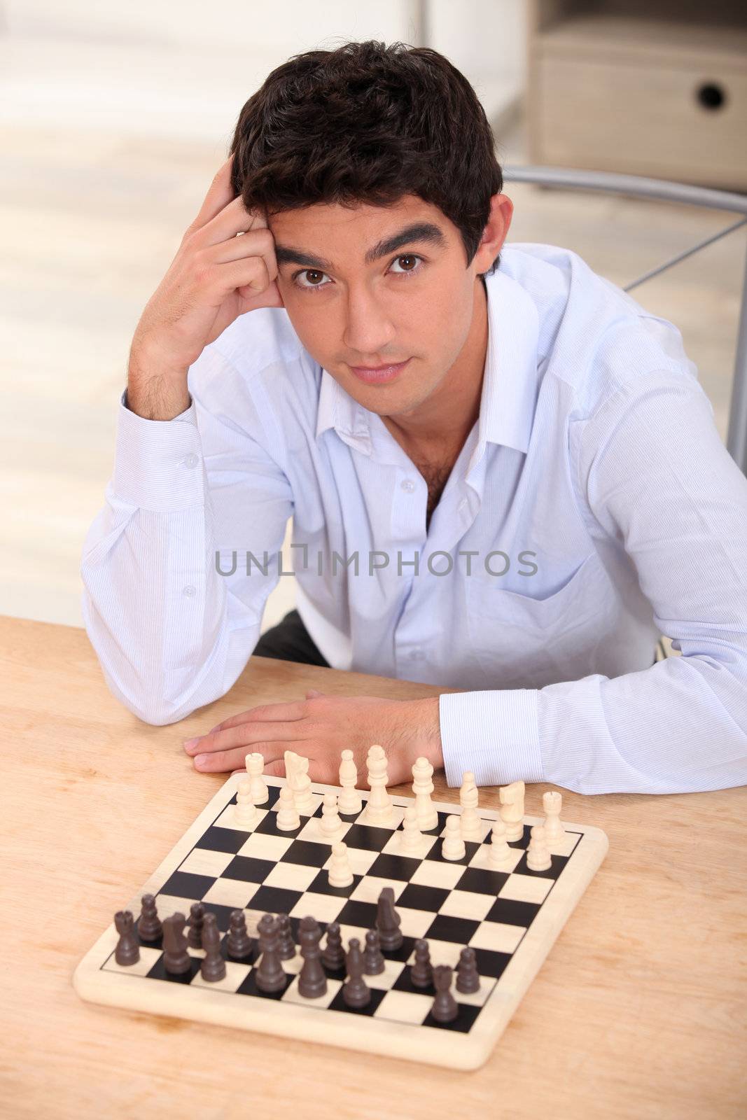 boy playing chess