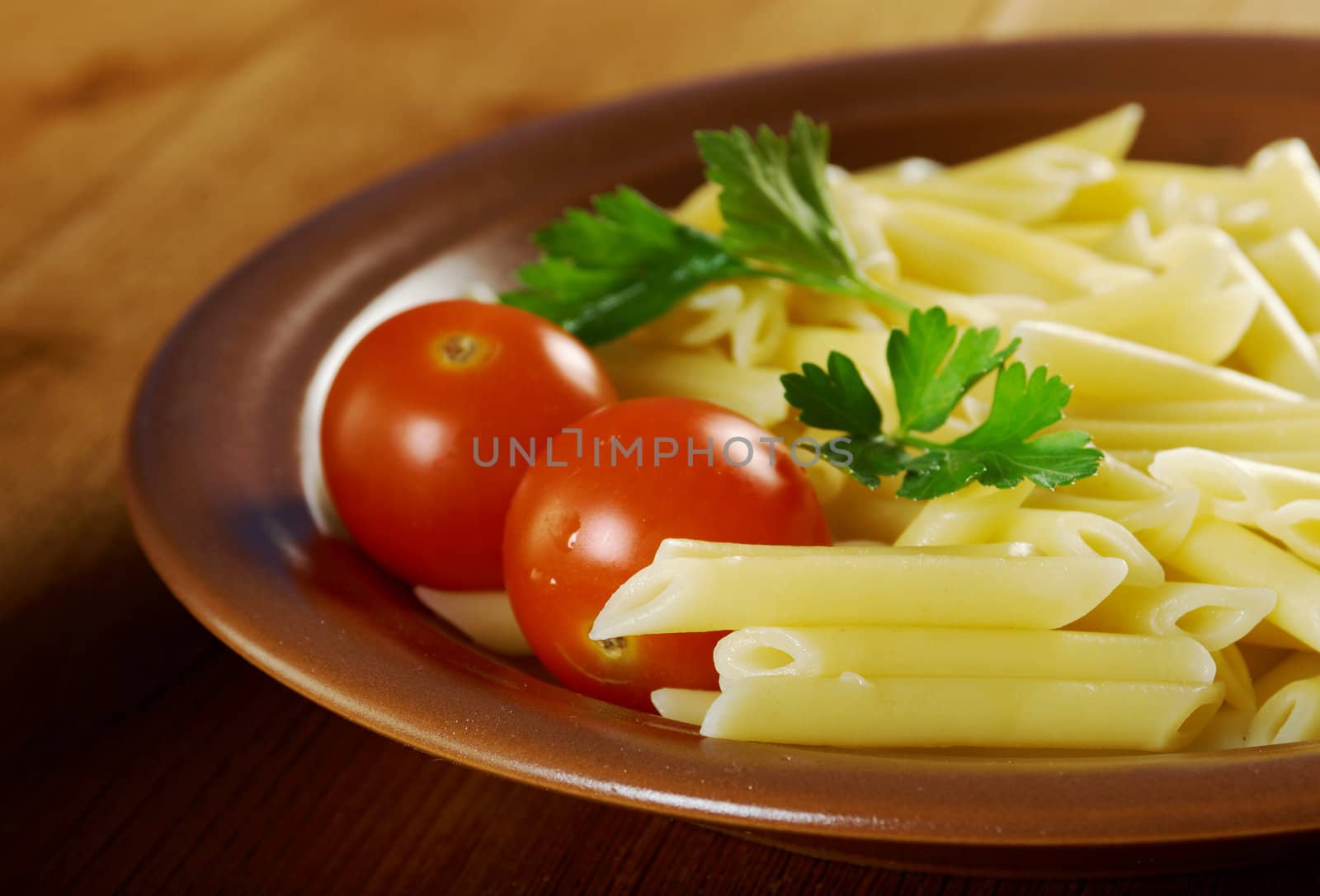 delicious macaroni pasta on wooden table