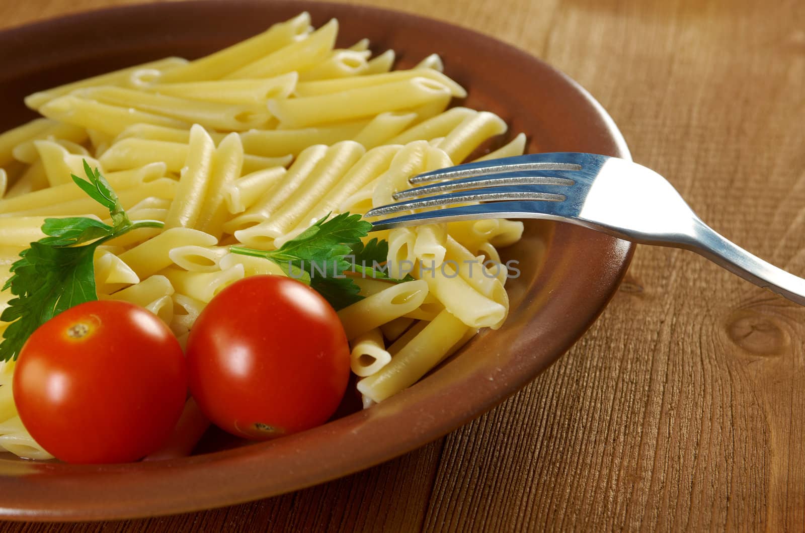 delicious macaroni pasta on wooden table