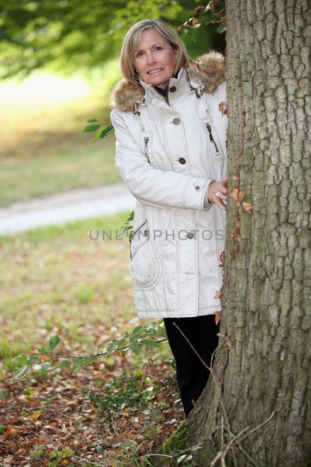 senior woman walking in the park