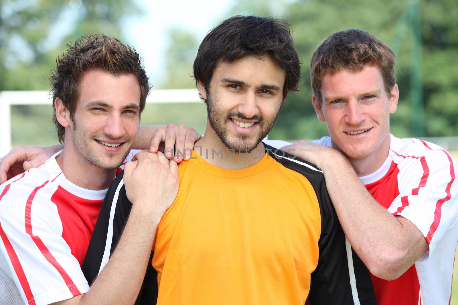 portrait of 3 football players by phovoir