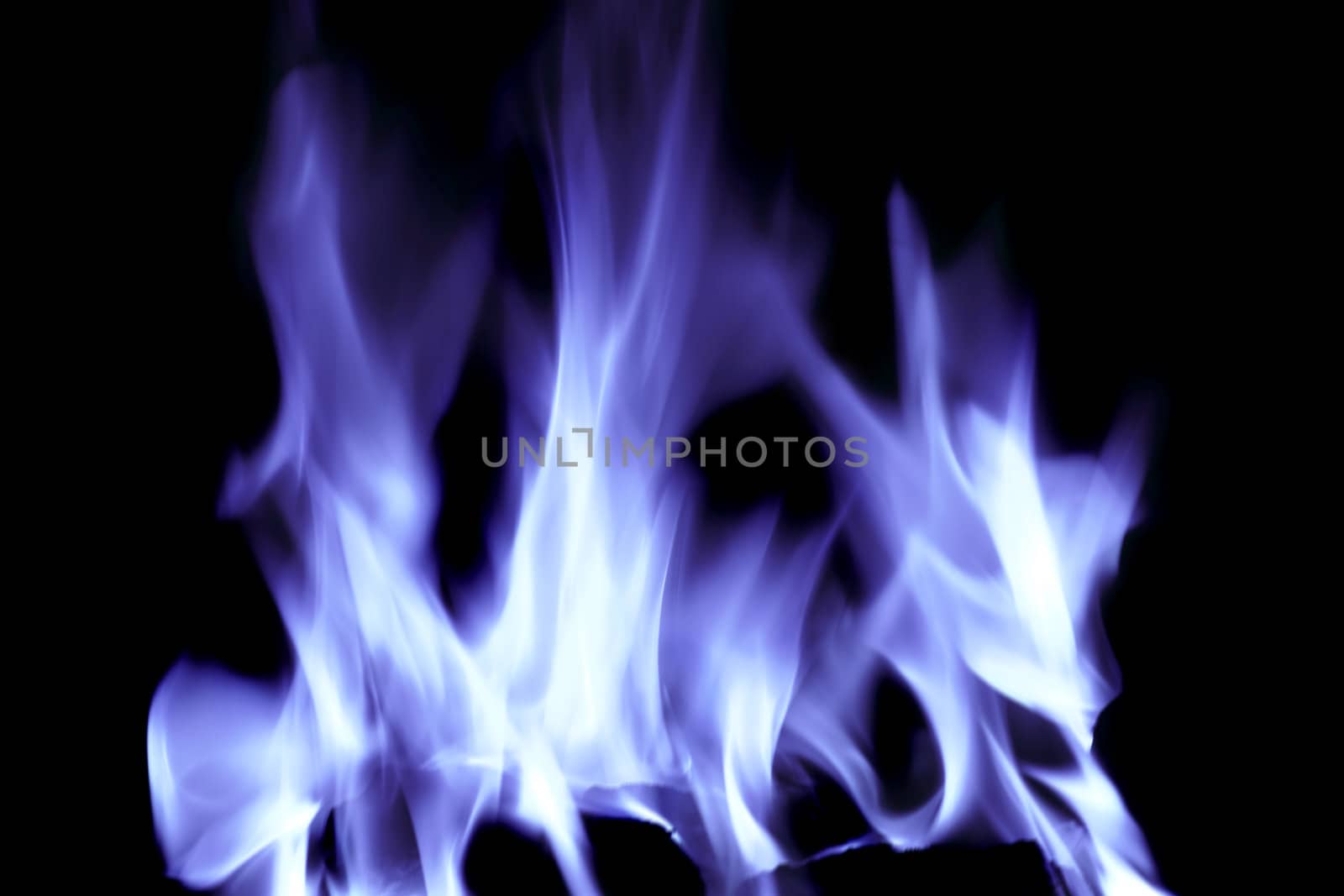 bright blue flames on an open fire that give that warm feeling