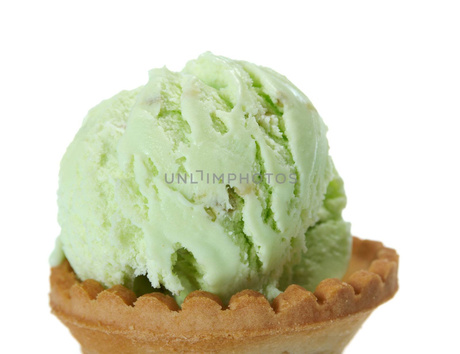 pistachio ice cream . closeup.isolated on white background.

