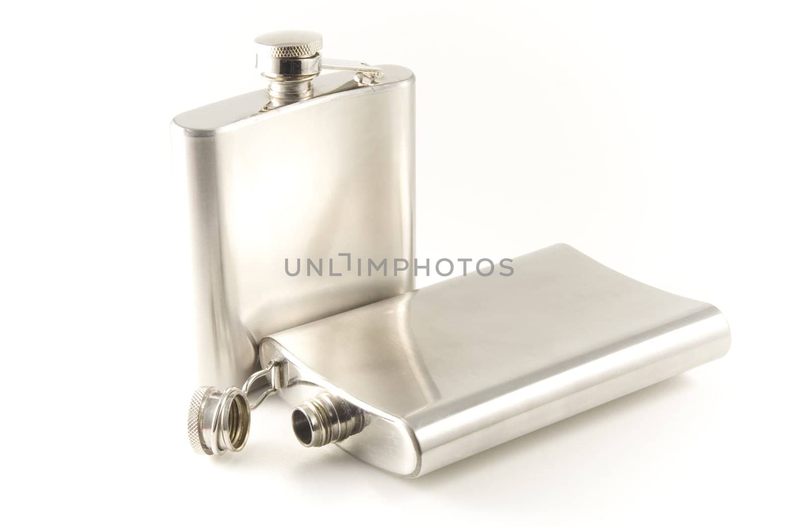 Flask for cognac and whisky from stainless steel  on white background