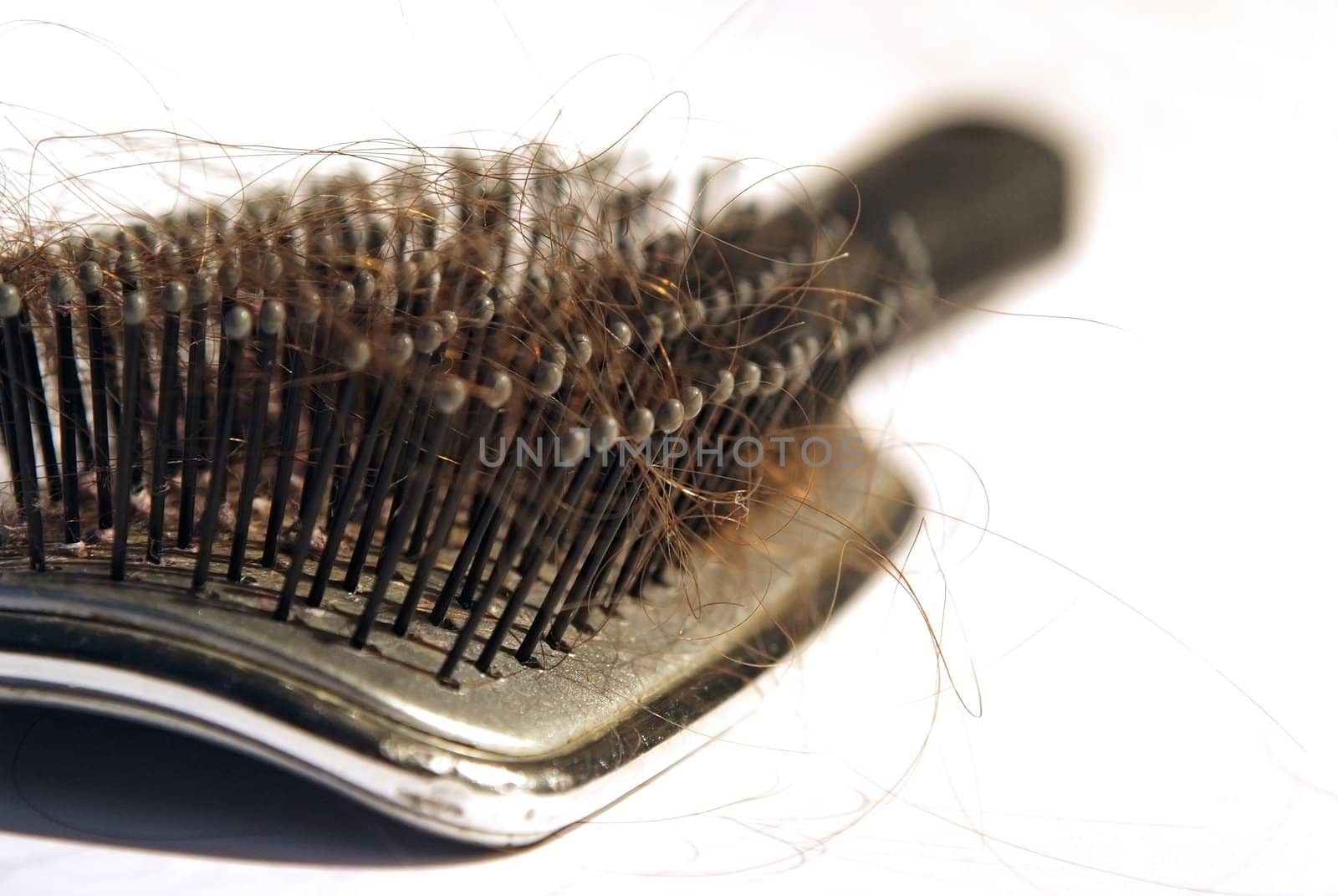 damaged hair on comb