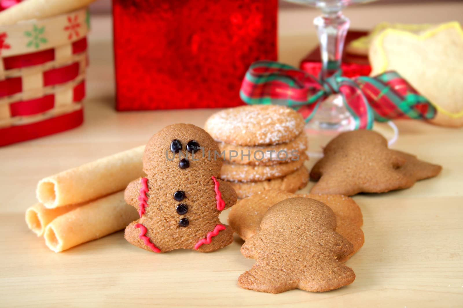 An assortment of cookies with a Christmas theme.