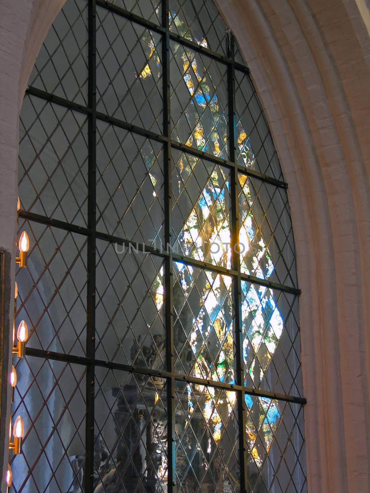 Church Stained Glass Window with Light Reflection