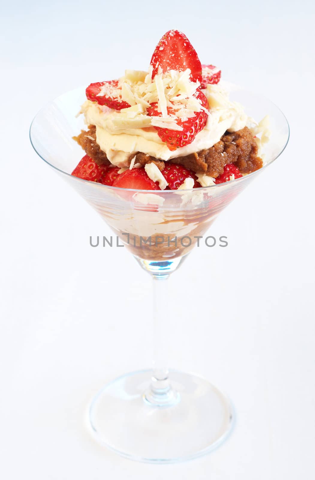 Italian dessert strawberry and mascarpone tiramisu in tall glass
