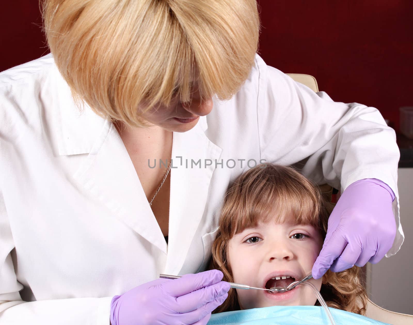 child patient at the dentist dental exam