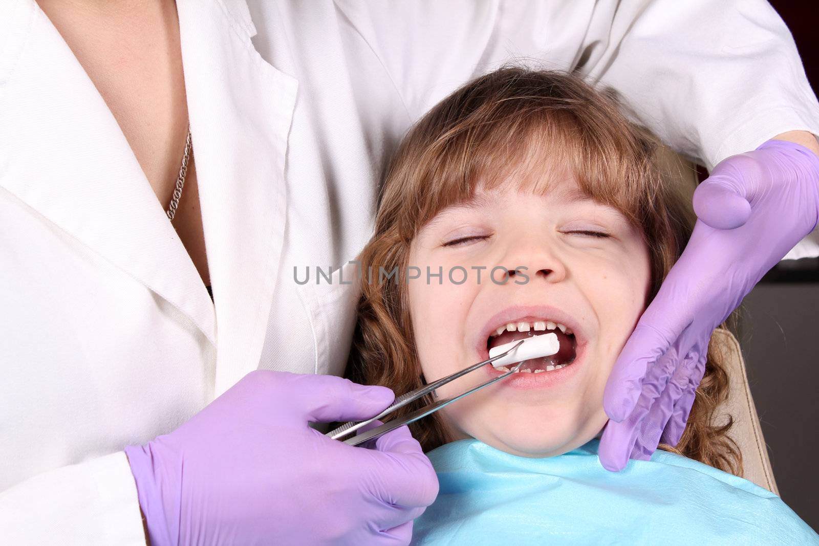 healthcare child patient at the dentist  by goce