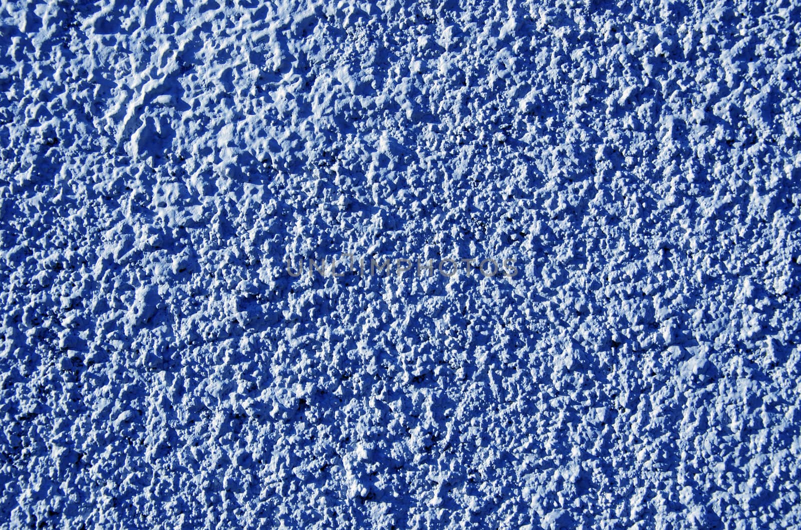 Blue painted textured walls closeup macro details. by sauletas