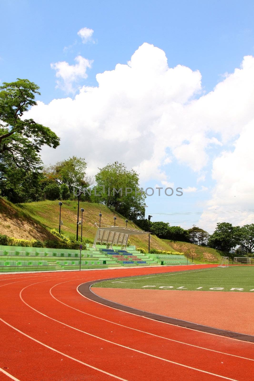 Empty stadium with chairs by kawing921