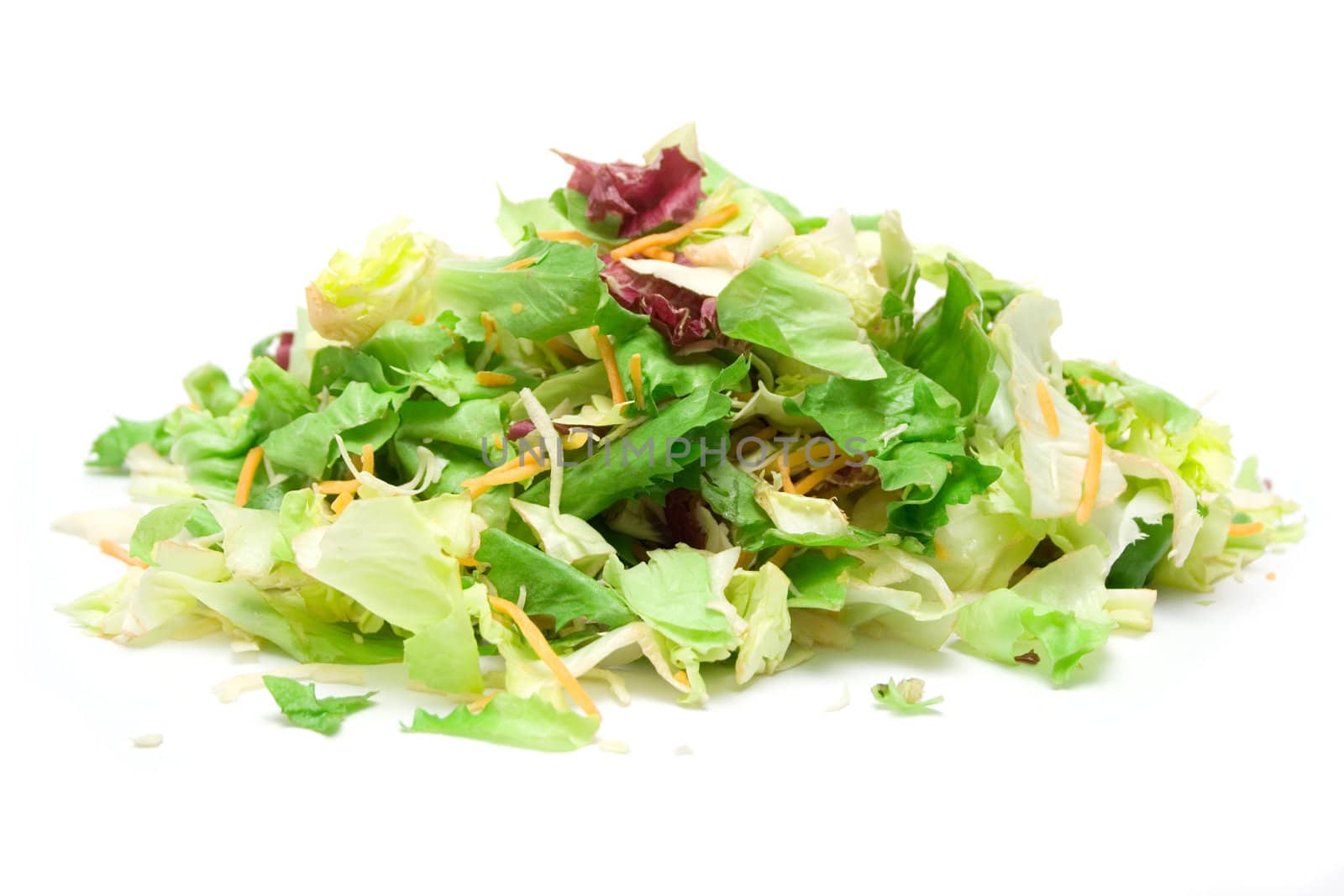 Pile of fresh salad isolated on a white background.