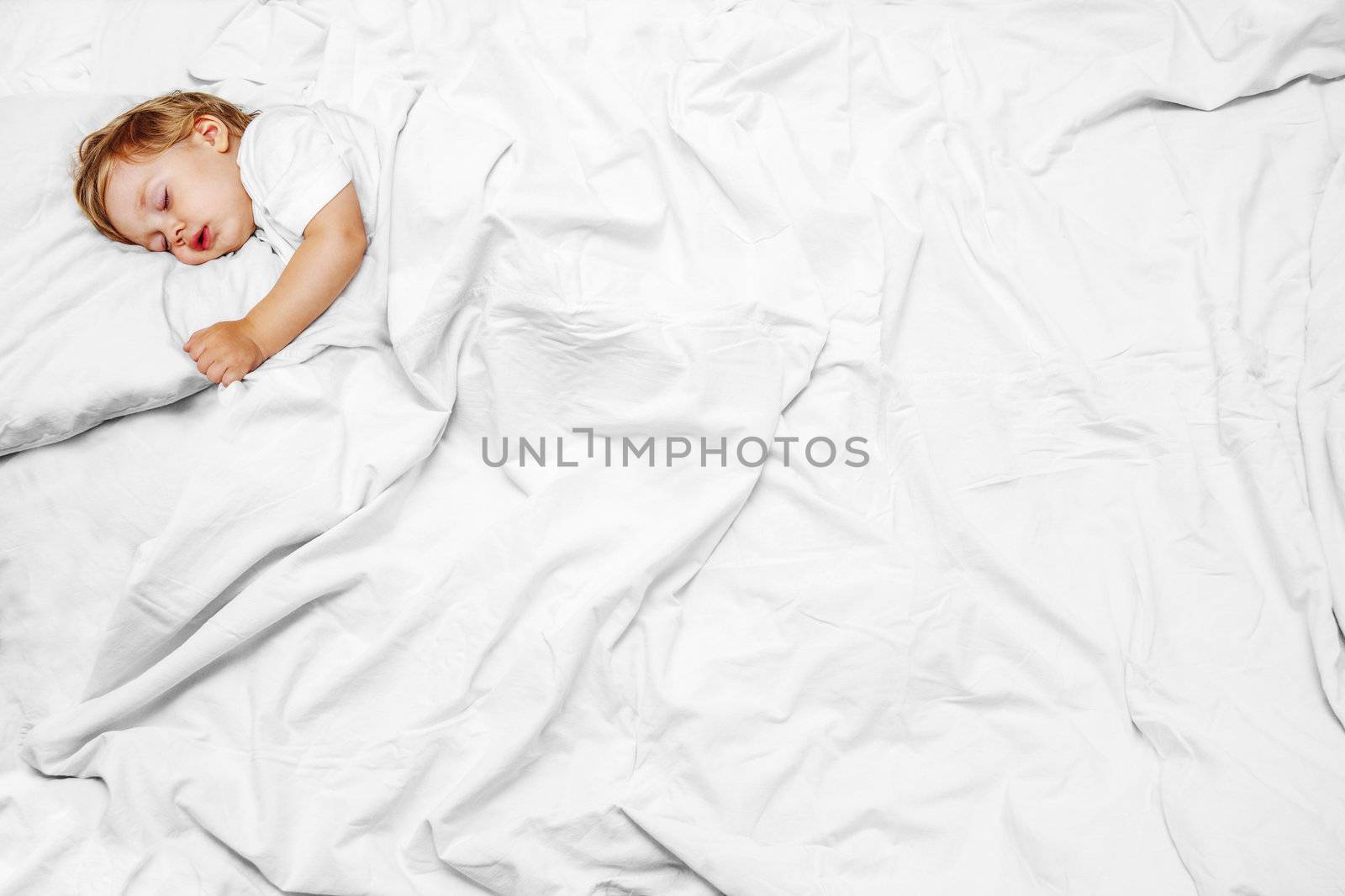 portrait infant lying on the bed