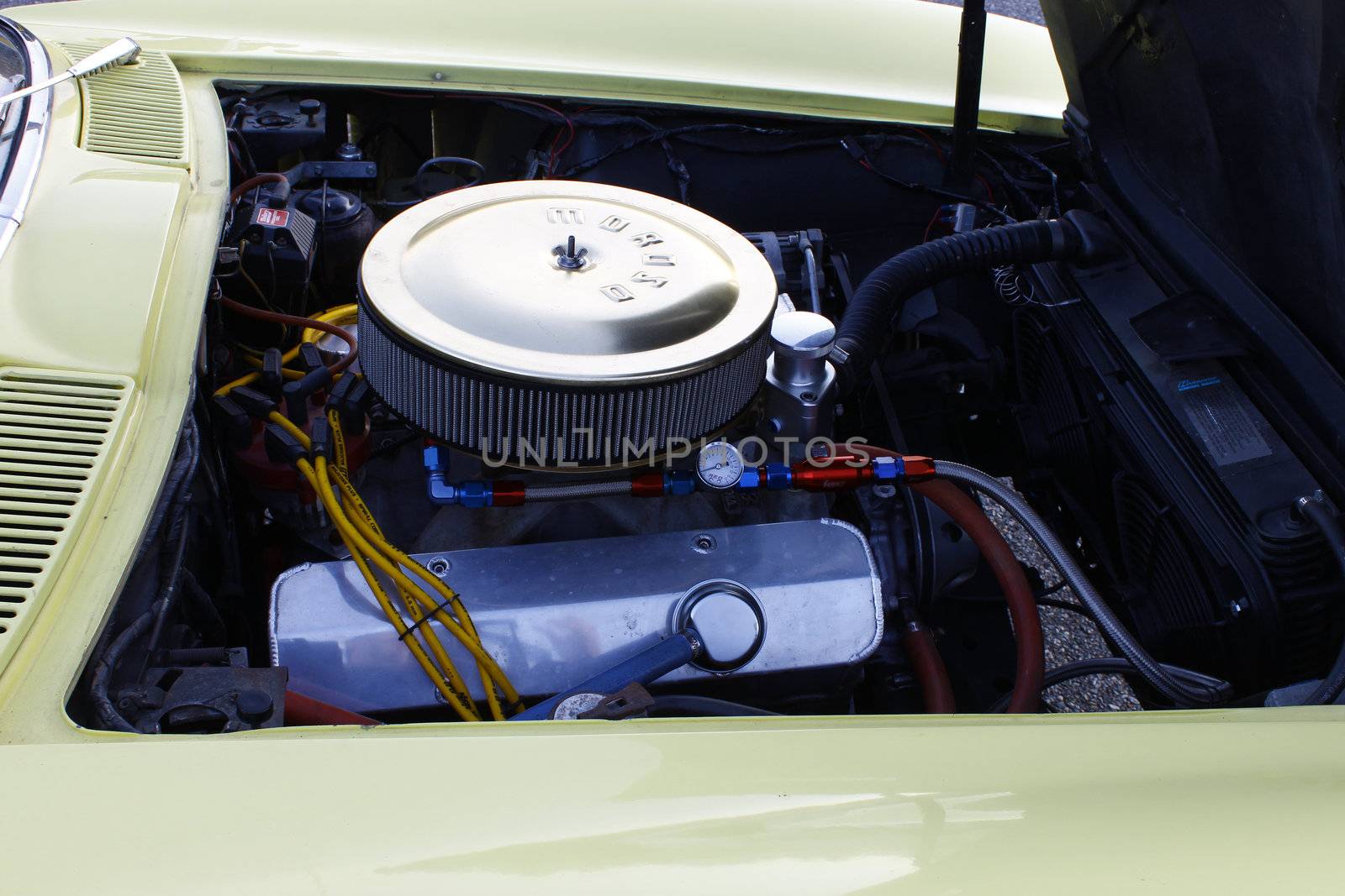 GLOUCESTER, VA, USA - OCTOBER 14: A 1965 Chevy Corvette  at the Middle Peninsula Classic Cruisers Club weekly Car Show. Main Street Center. on October 14, 2011 in Gloucester, VA, USA