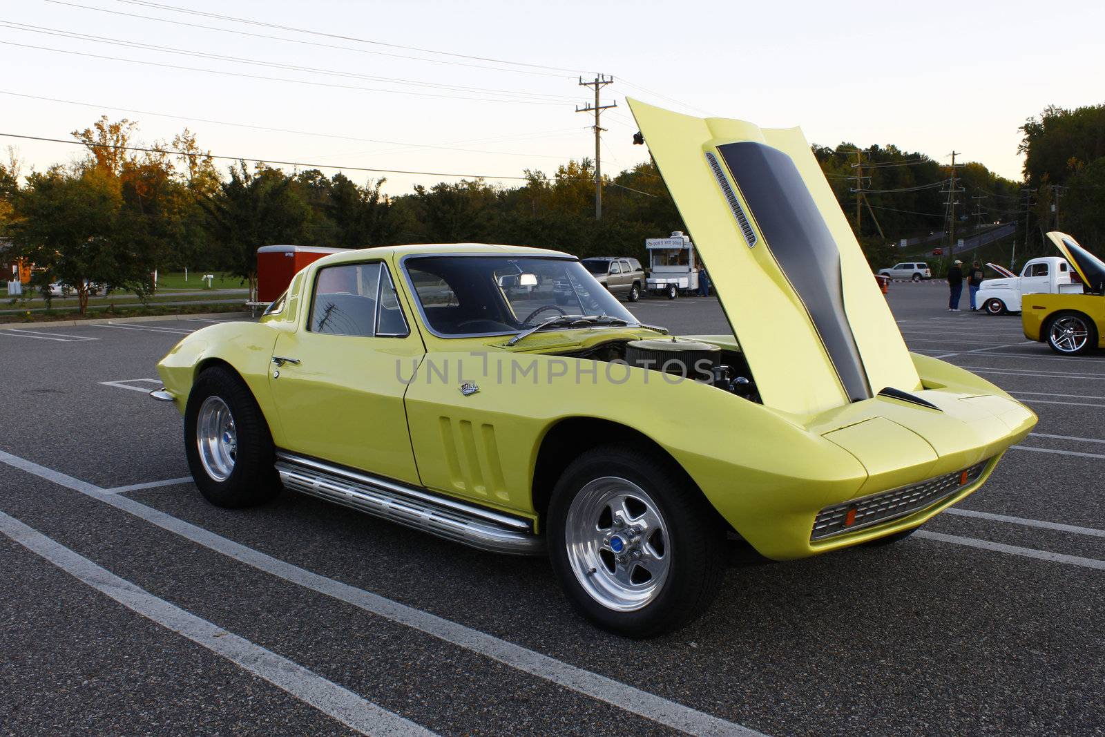 GLOUCESTER, VA, USA - OCTOBER 14: A 1965 Chevy Corvette  at the Middle Peninsula Classic Cruisers Club weekly Car Show. Main Street Center. on October 14, 2011 in Gloucester, VA, USA
