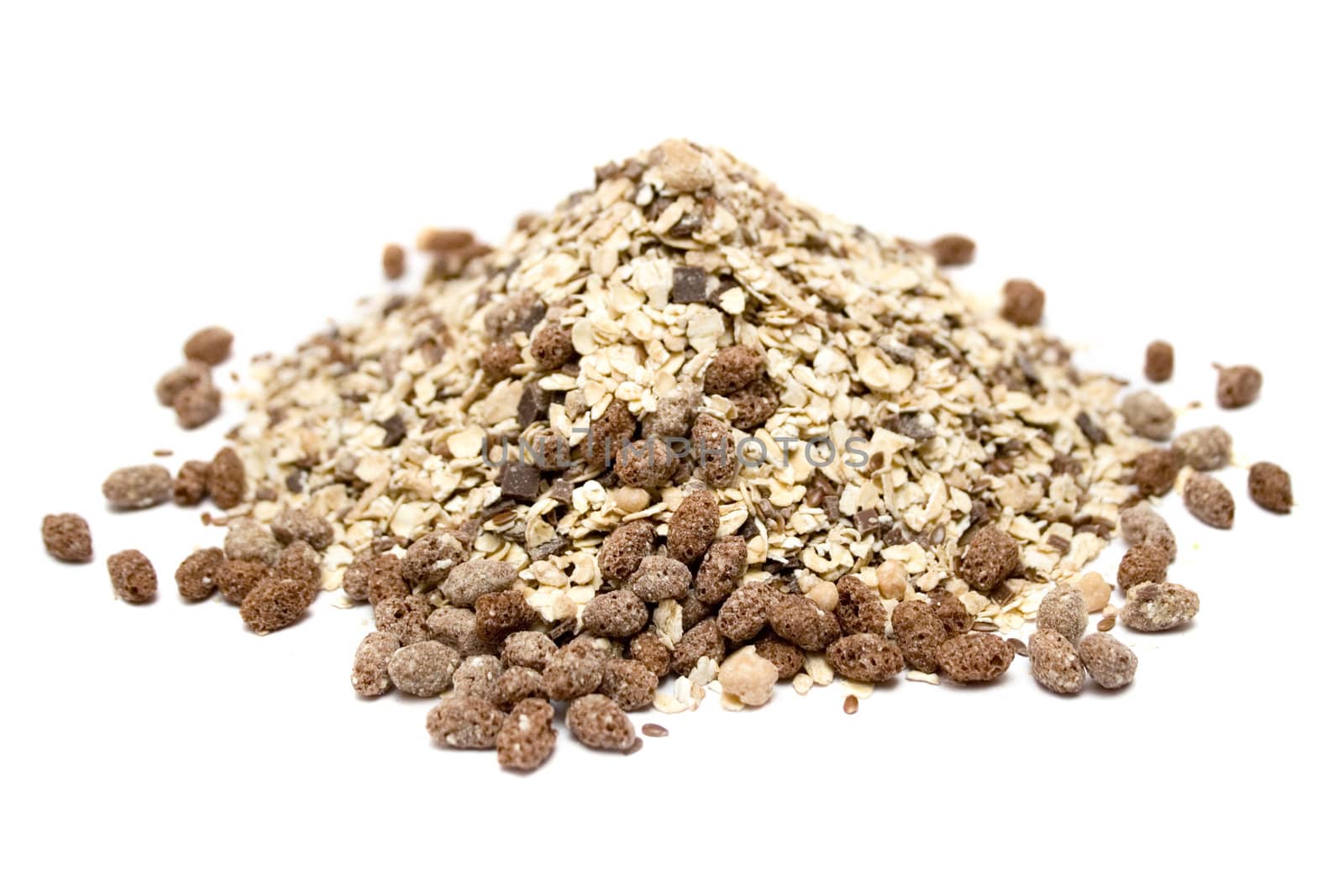 Pile of healthy muesli isolated on a white background.