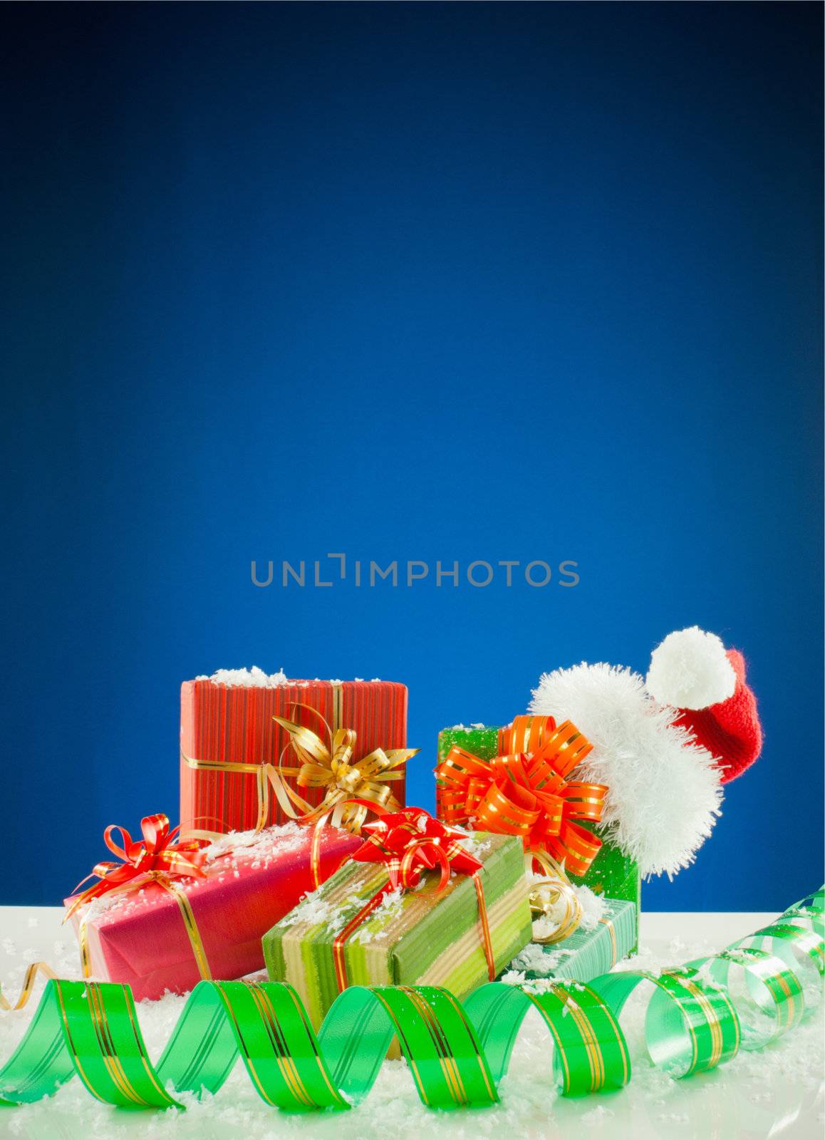Christmas presents against blue background
