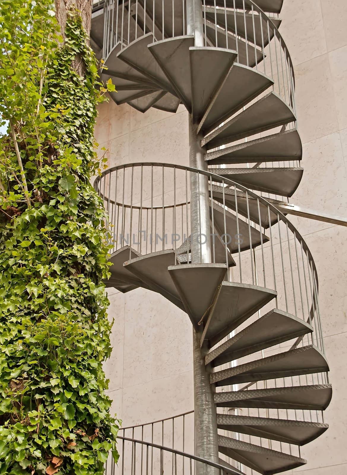 spiral staircase in Paris (France), contrast of two materials