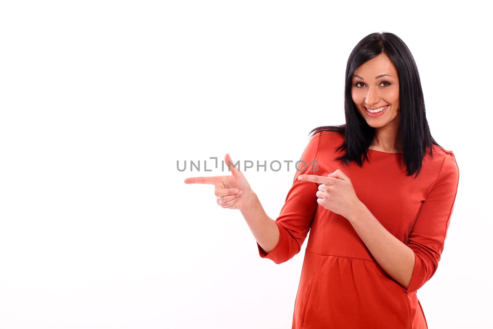 Beautiful caucasian woman shows on something isolated over white background