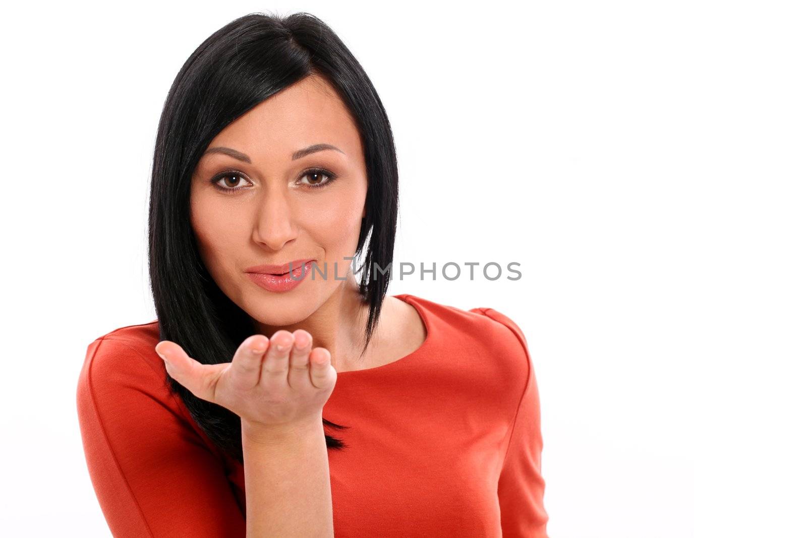 Beautiful caucasian woman send a kiss isolated over white background