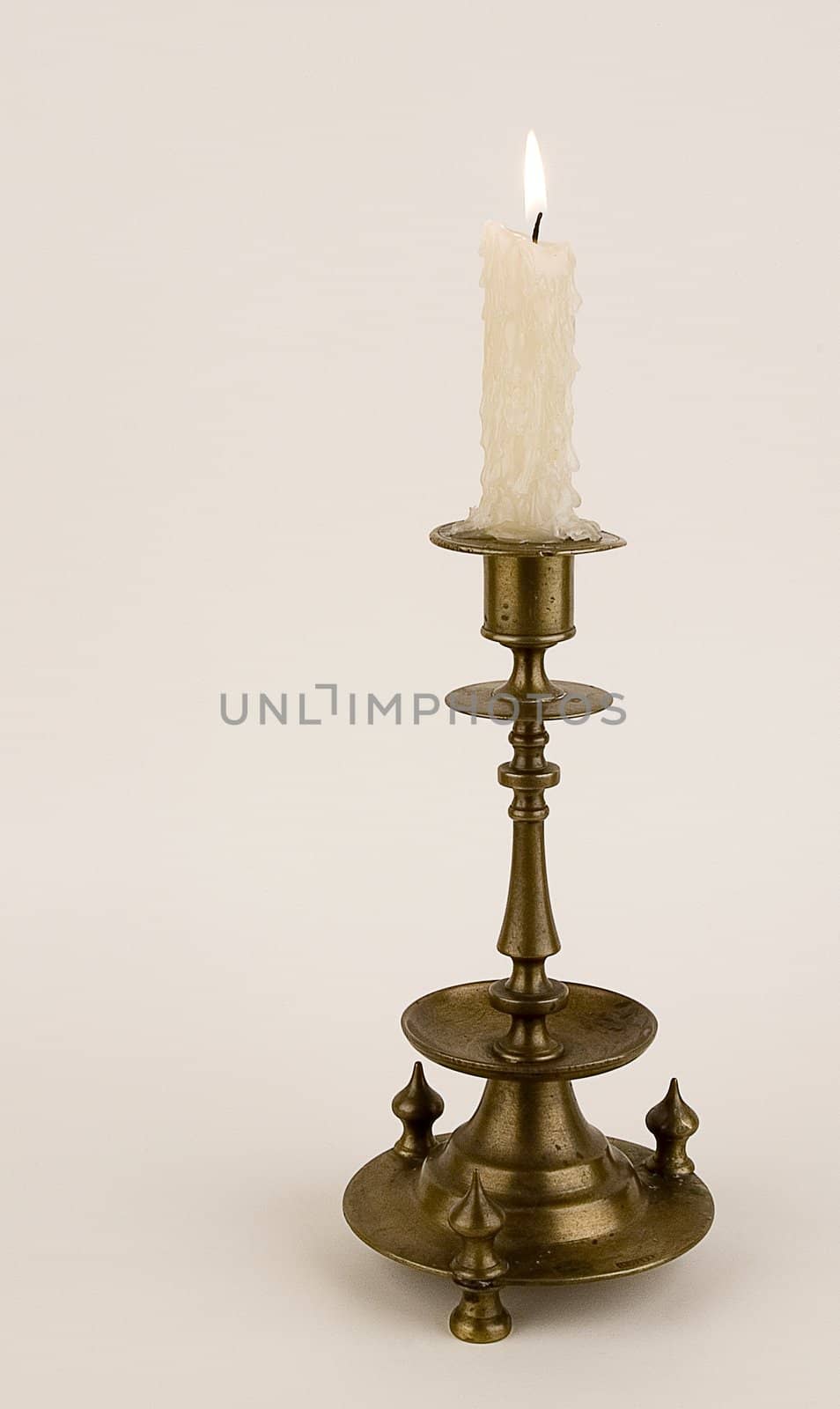 Bronze candlestick. Is used to illuminate the premises