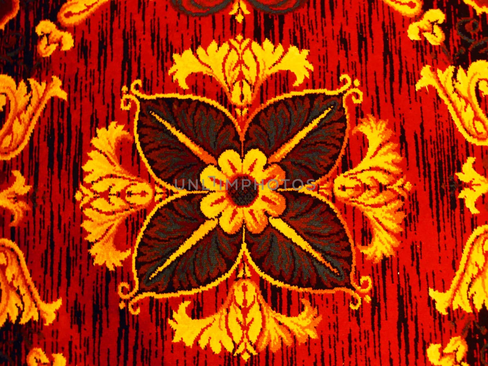 a bright red and yellow pattern with texture