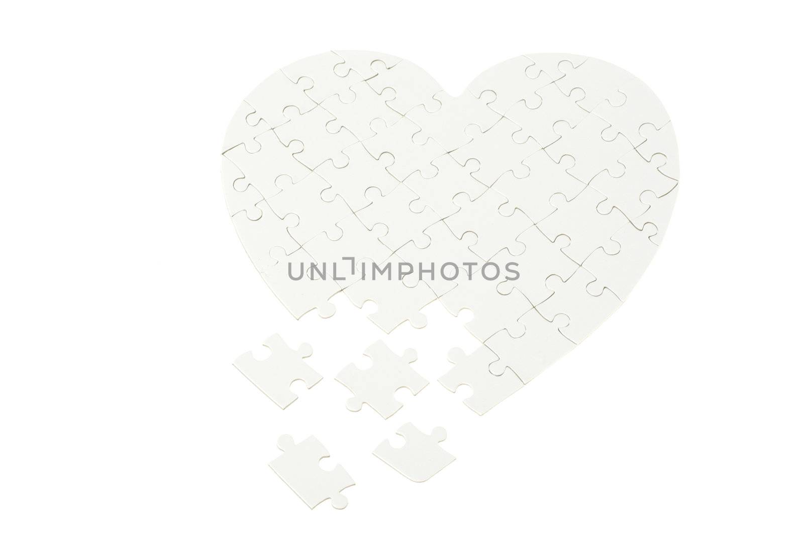 heart made from the puzzle on white