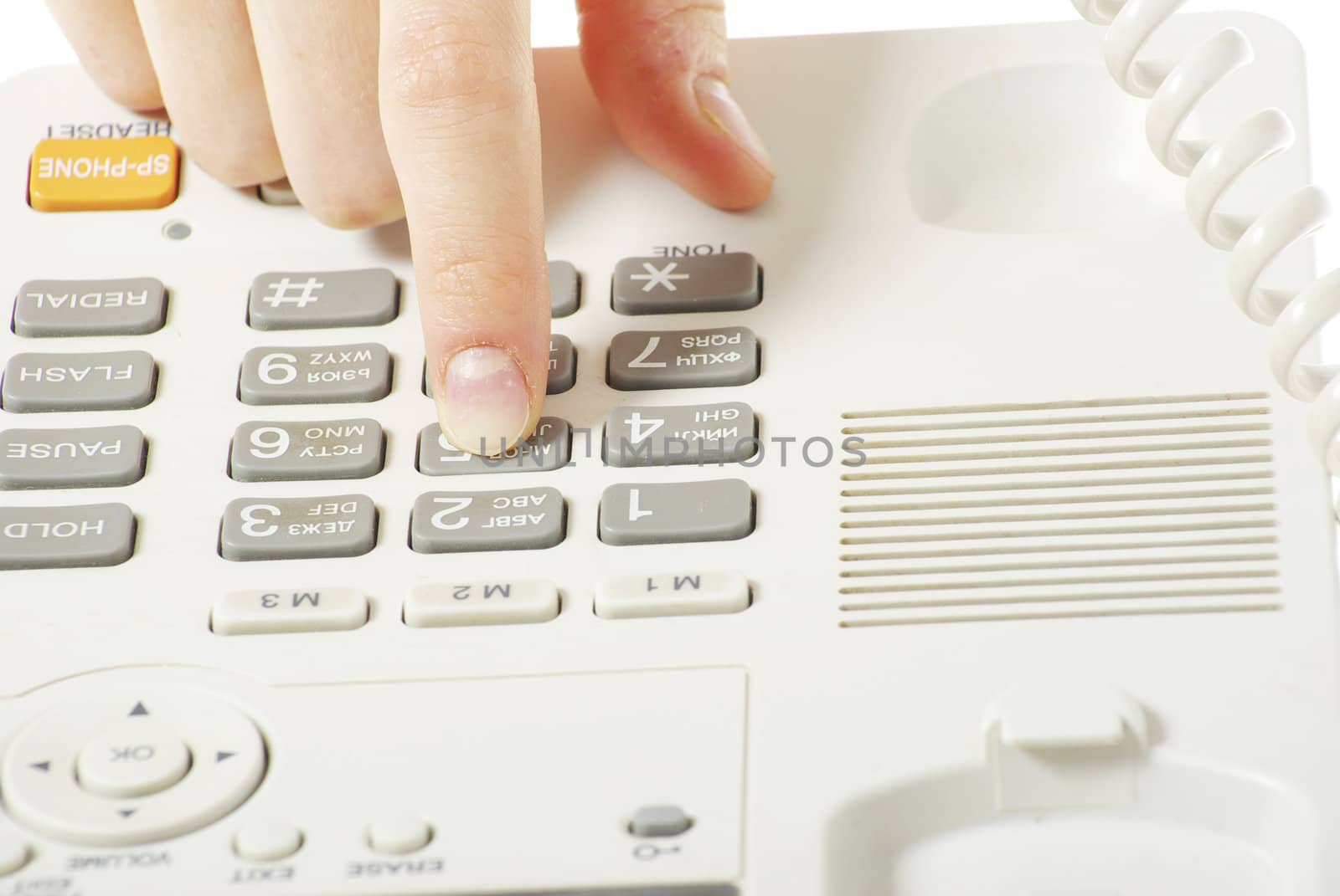 finger with  white telephone keypad