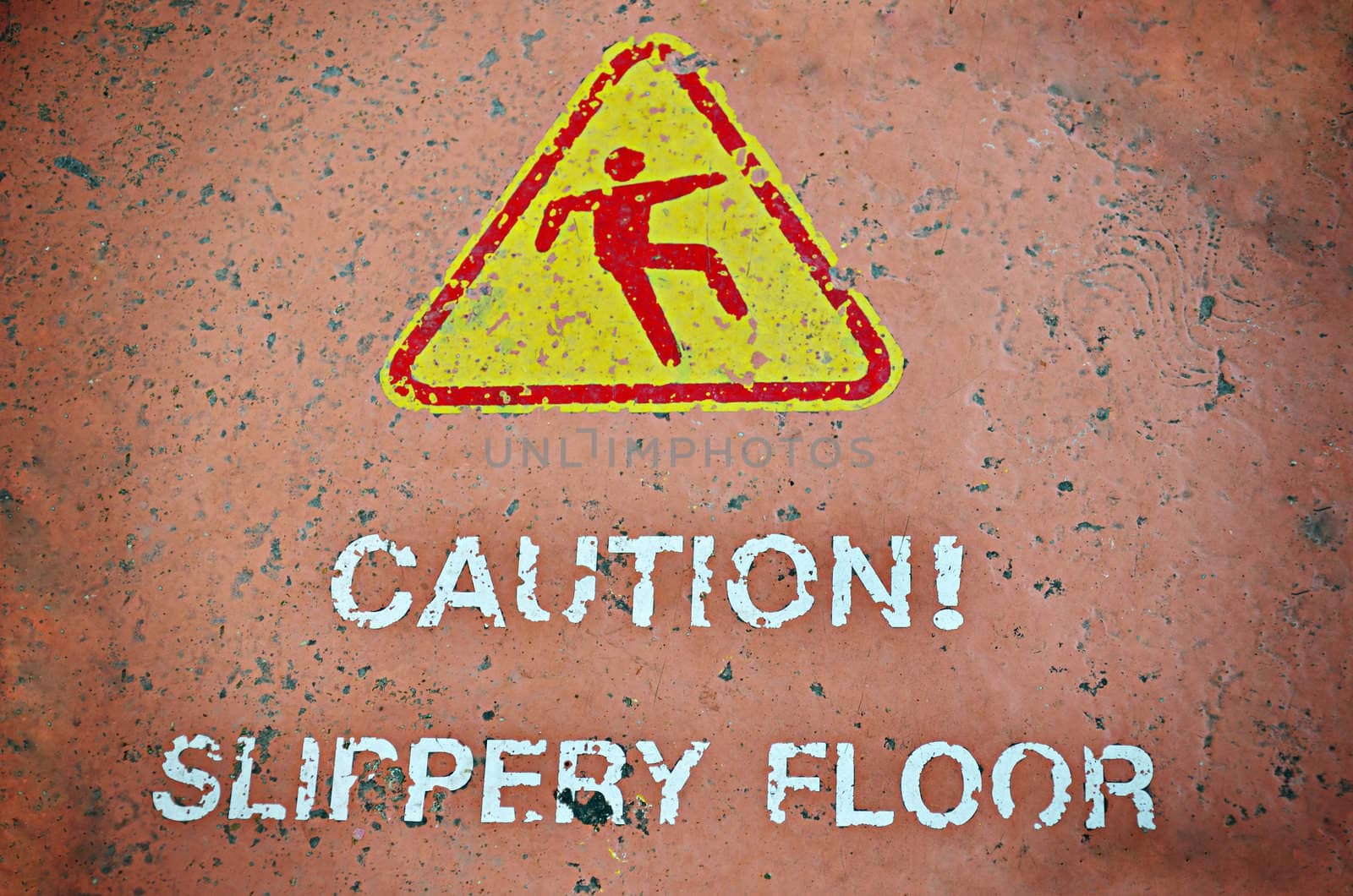 Caution slippery floor sign on floor