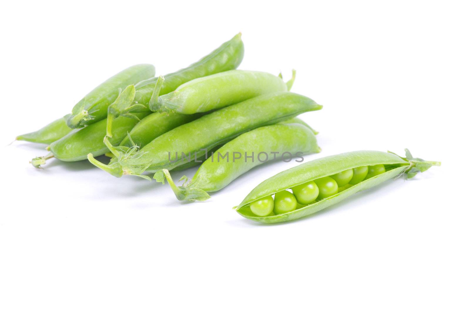 green peas vegetable closeup isolated on white