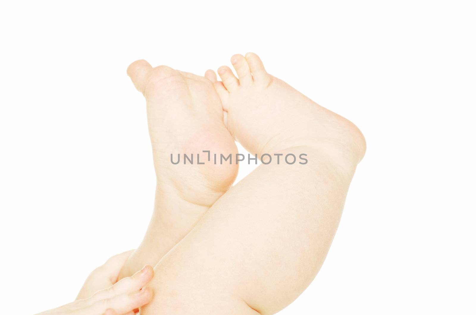 newborn baby feet and hands isolated on white