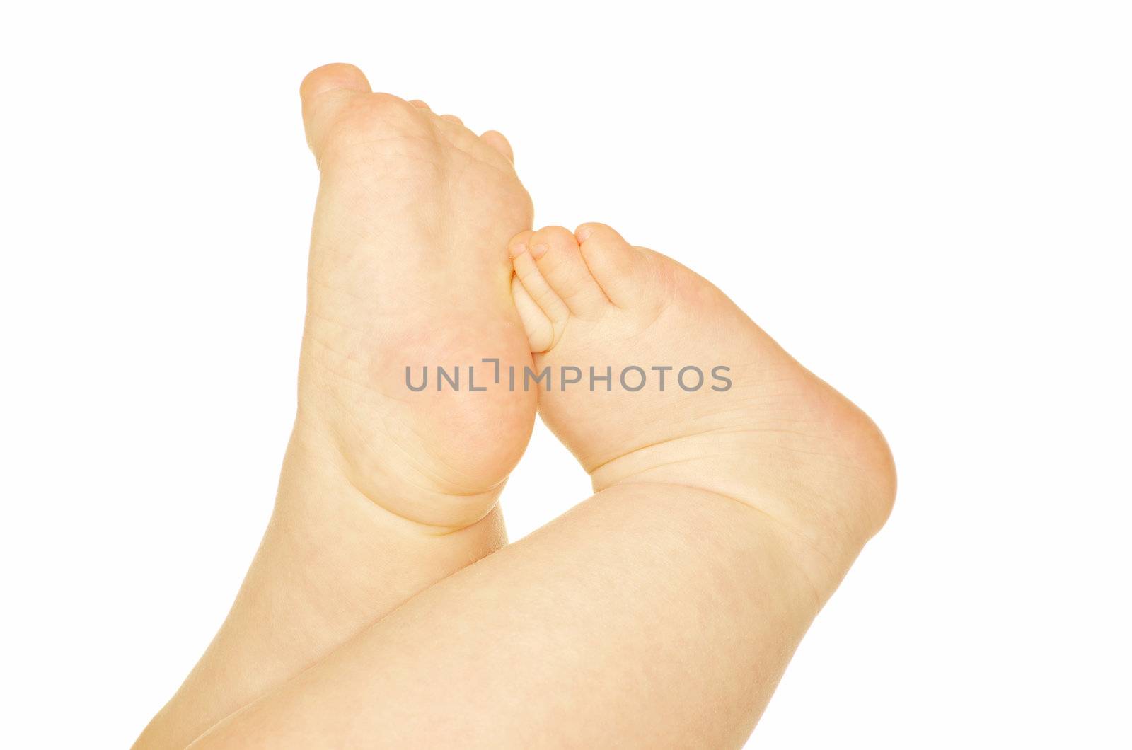newborn baby feet isolated on white