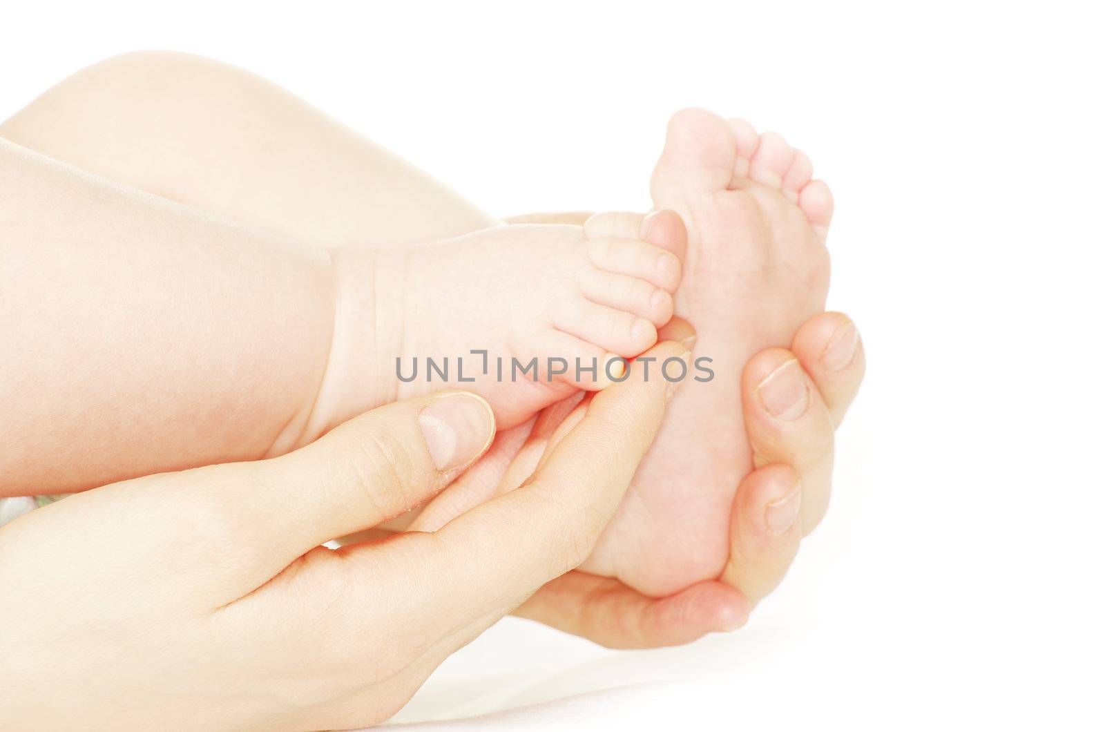 newborn baby feet isolated on white