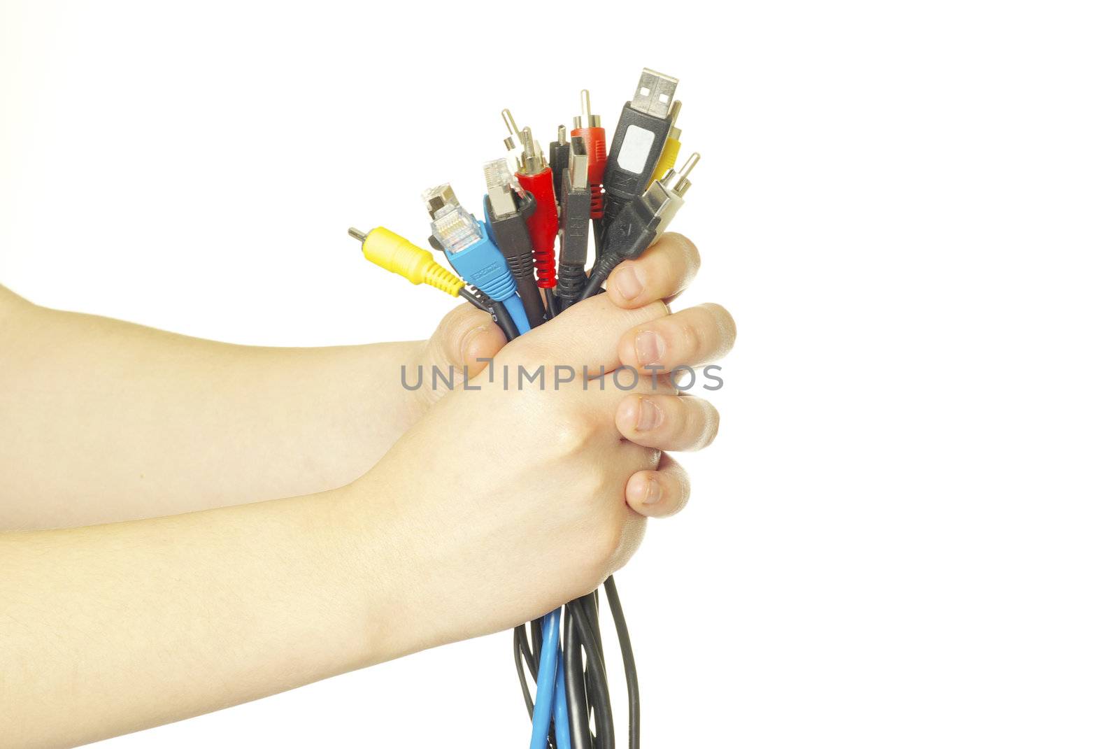 Computer cables in hand isolated on white background