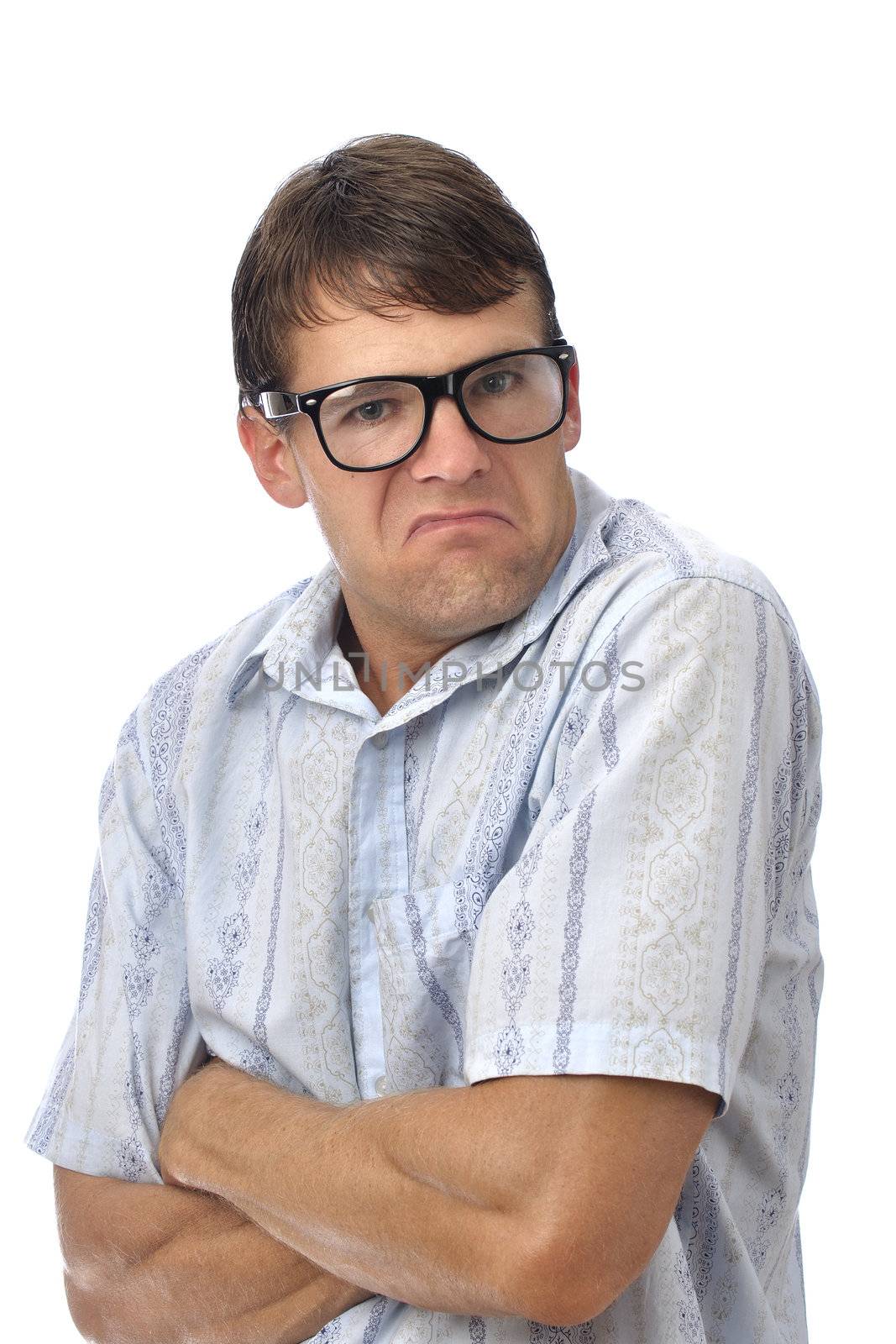 Male nerd with glasses makes pouty face on white background
