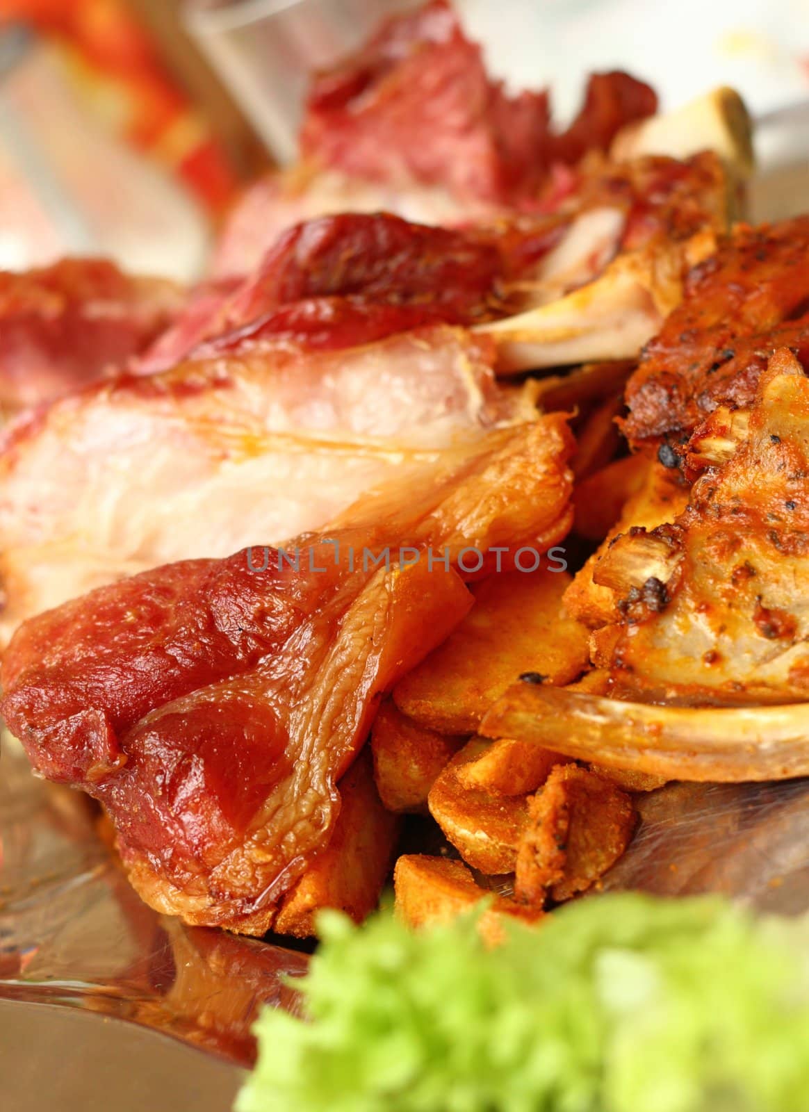 portion of grilled bacon with green salad
