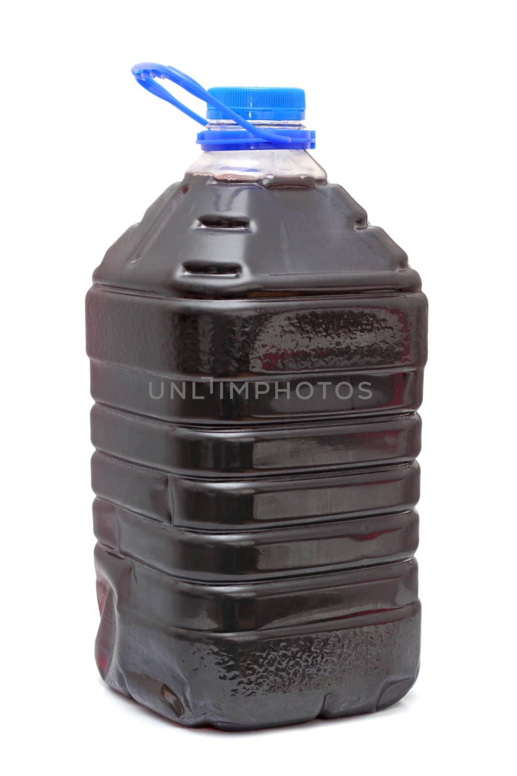 homemade red wine in plastic container with blue cap over white background