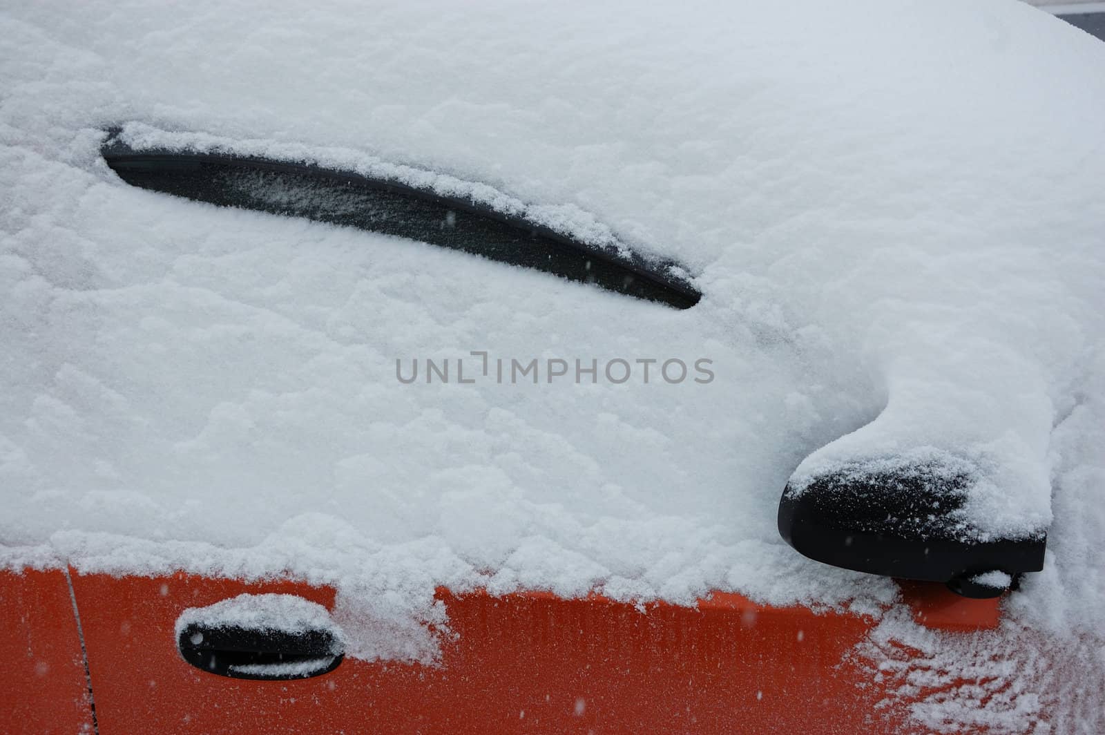 Cars on street in snow storm