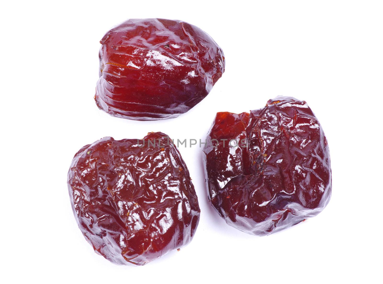 dryed dates on white background